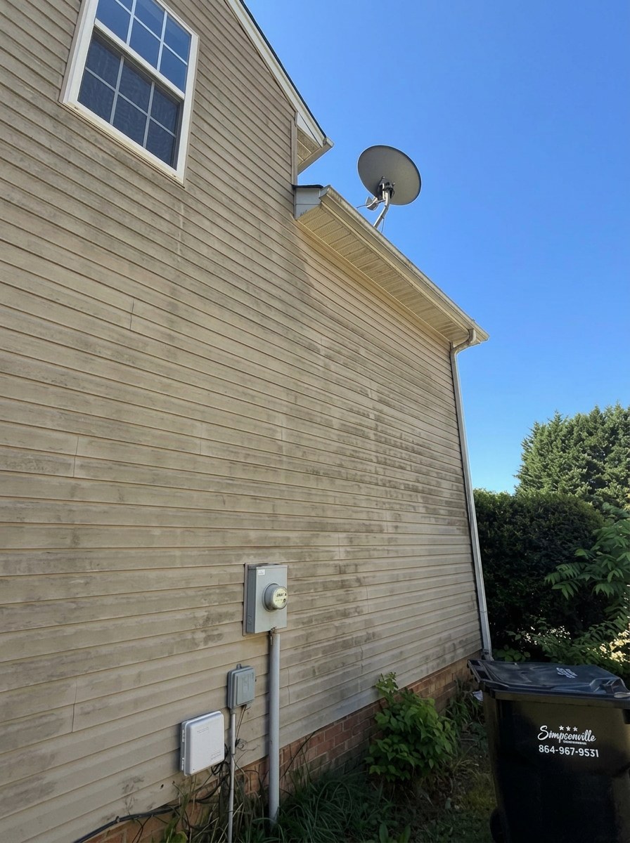Two-story house side before cleaning